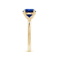 Round Lab-Grown Blue Sapphire Solitaire Engagement Ring with Heart-Shaped Prongs