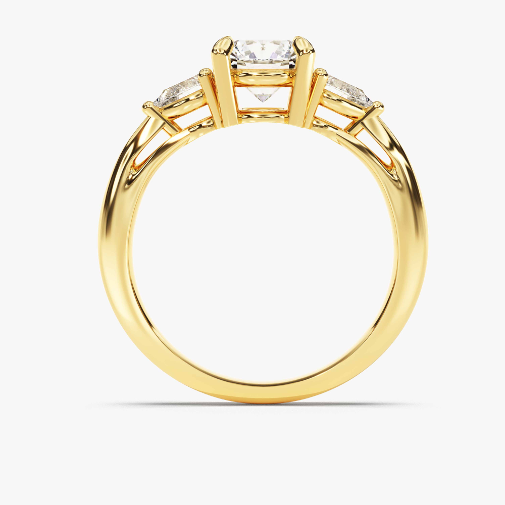 Three‑Stone Moissanite Engagement Ring with Pear‑Cut Accents