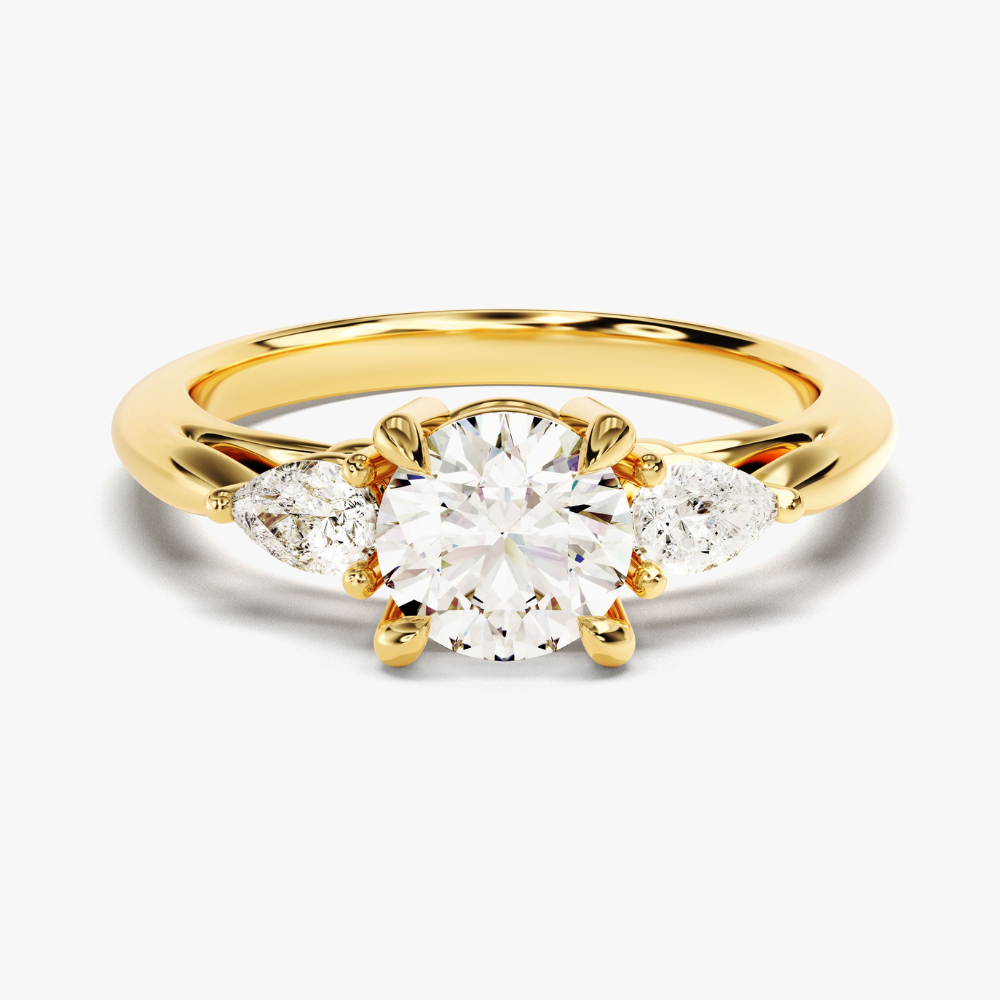 Three‑Stone Moissanite Engagement Ring with Pear‑Cut Accents