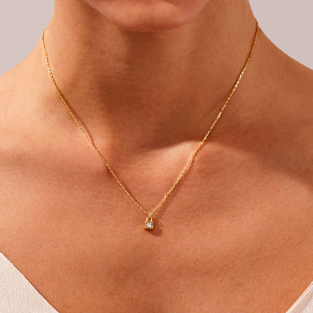 0.1 CTW Mini Lock Round Cut Moissanite Pendant Necklace