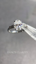 Load and play video in Gallery viewer, Symphony Three Stone Oval Cut Moissanite Engagement Ring
