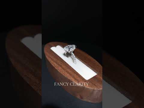 Refined Radiance Pear Moissanite Halo Engagement Ring