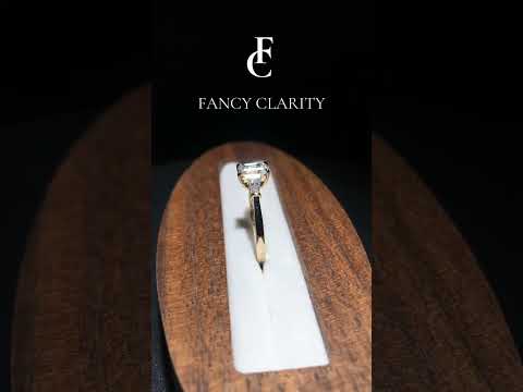 Symphony Three Stone Emerald Cut Moissanite Engagement Ring
